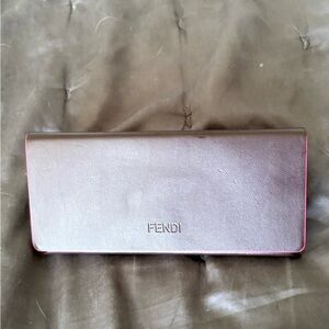 Fendi triangle glasses case.